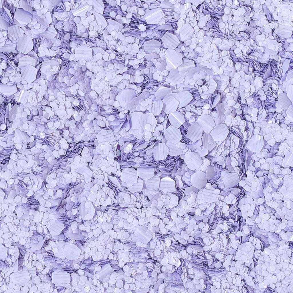 Close-up of purple glitter with a textured surface